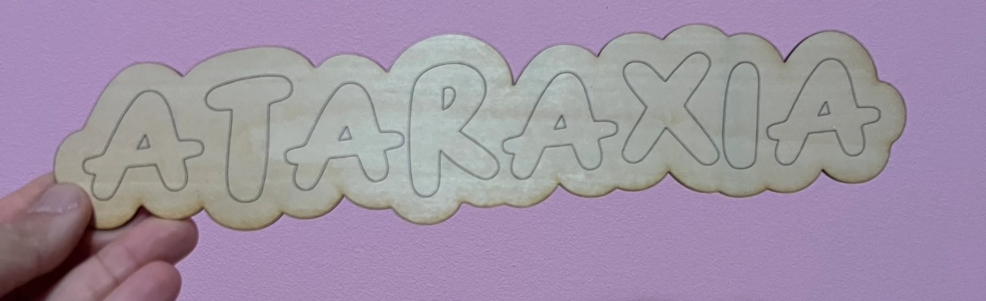 resultado tras el corte y grabado en madera del cartel Ataraxia